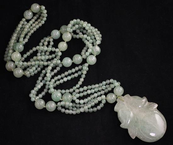 A multi bead jadeite drop pendant necklace, 34in.